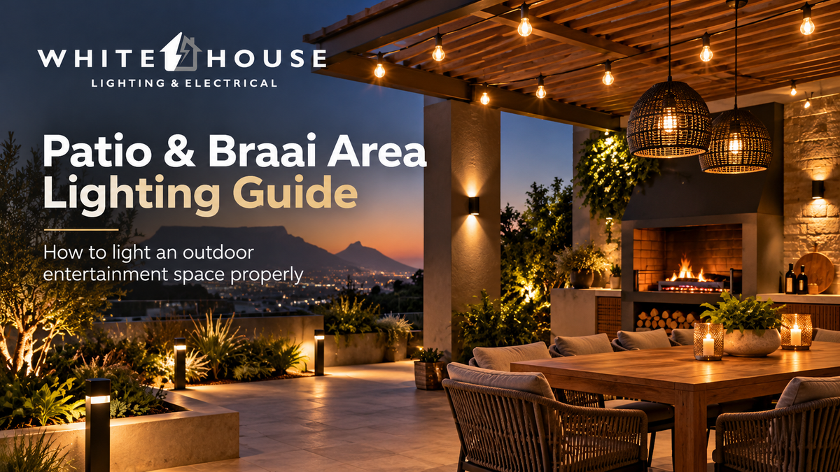 Modern South African patio and braai area with warm string lights, wall lights and garden lighting.